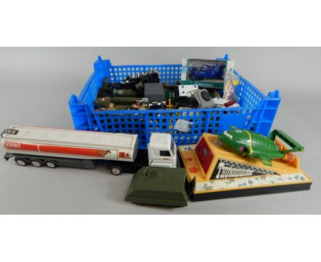 Various die cast army vehicles, Britain's plastic army boat, 13cm wide, helicopter, Thunderbird 2, Britains plastic barrels i