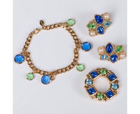 Vibrant blue and green stones adorn these beautiful pieces. The brooch is a wreath shape with square and round faceted stones