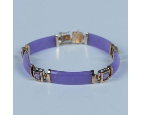Gorgeous purple jade and amethyst set in 14k gold with a box tab clasp. It measures 7.5"L when laid out flat. Condition: Age 