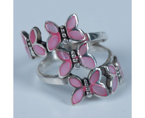 Cute sterling silver ring with five tiny butterflies that have delicate wings featuring pink mother of pearl inlay. Size 7. 4