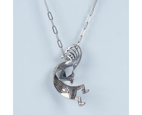 Southwestern hand crafted sterling silver Kokopelli figure pendant measuring 1.5"L x 1.25"W. Makers mark is near the bail. Th