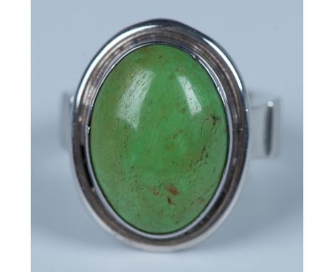 Beautiful Southwestern piece from New Mexico. Sterling silver ring with a green gaspeite stone. Desert Rose Trading mark on t