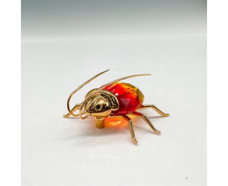 Beautiful fire red with yellow crystal figural surrounded by gold toned sterling silver head, body, legs and antennae. Swarov