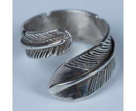 Cute Southwest Native American detailed hand crafted sterling silver feather ring. It can be adjusted for size and has sterli