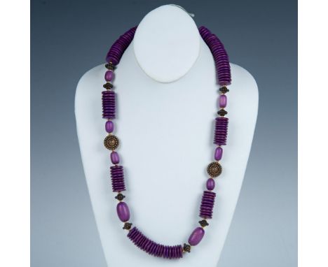 This beautiful vintage necklace has copper tone and purple wooden beads with gold metal spacers. Dimensions: 26.75"LCondition