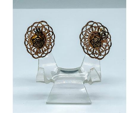 These vintage clip-on earrings feature an elegant gold tone fan backing in filigree design adorned with a delicate rose. Issu