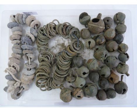Quantity of medieval lead spindle-whorles, bronze crottle bells and rings&nbsp;  