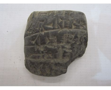 Small cuneiform pottery accounts tablet, circa 200BC, with accompanying written inscription 'Small accounts tablet .. receipt