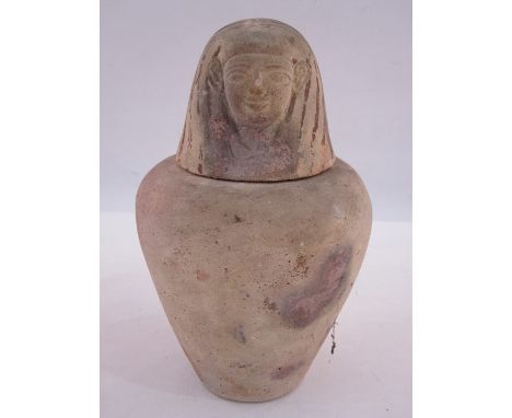 Egyptian painted terracotta canopic jar with lid, representing one of the sons of Horus, circa 1st millennium BC, with label 