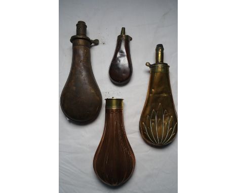 Embossed copper shot flask, and embossed brass shot flask, and two further shot flasks (4)