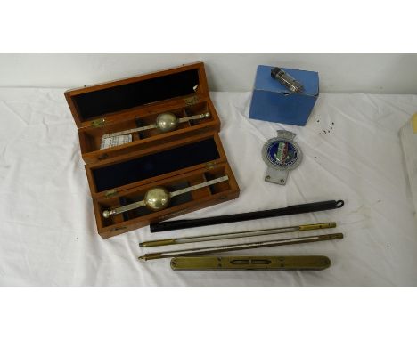 Marine hydrometer marked Dobbie McInnes Ltd, Glasgow Greenock, in case, a further marine hydrometer, three thermometers, a le