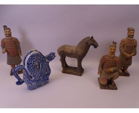 CHINESE POTTERY WARRIOR FIGURINES, horse and a lidded dragon teapot in blue and white, incised and printed marks, 25cms the t