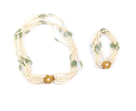 A Chinese freshwater pearl and jade six strand necklace, on a gilt metal floral clasp stamped silver, together with a matchin