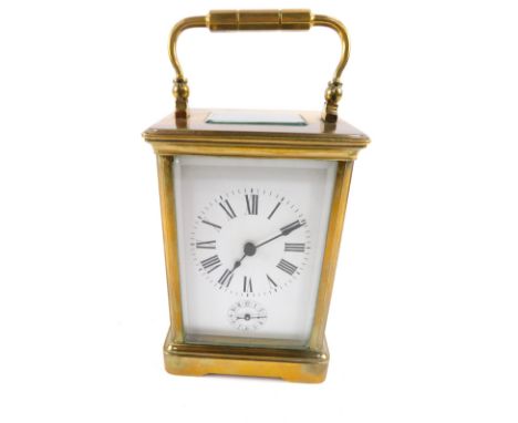 A brass cased alarm carriage clock, rectangular enamel dial bearing Roman numerals, subsidiary alarm dial, barrel movement, t
