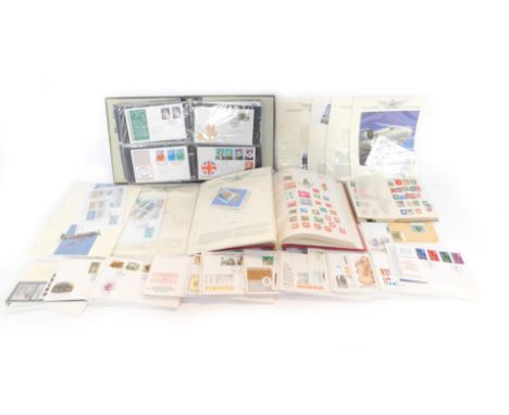 Philately. GB First Day Covers, in an album and loose, Tower stamp album containing GB, Commonwealth and World stamps, spares