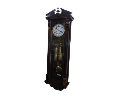 A 20thC Continental mahogany cased wall clock, brass dial with enamel chapter ring bearing Roman numerals, two train eight da