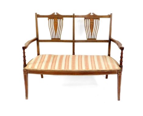 A Victorian mahogany bow fronted two seater sofa, with satinwood floral and harebell inlay, together ivory line inlay, stripe