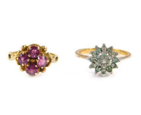 A 9ct gold and amethyst four stone ring, size O/P, 2.9g., and a further gem set ring. (2)