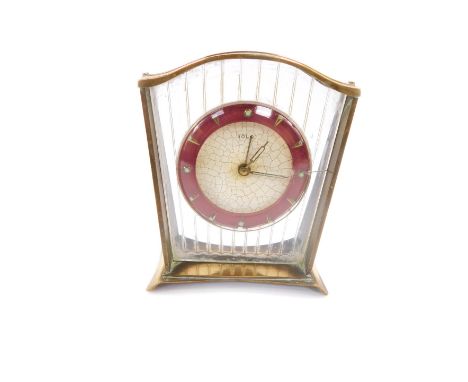 A mid 20thC French Solo bedside alarm clock, circular cracked ice white dial, with red chapter ring, clockwork movement, the 