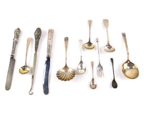 A George V silver sugar sifting spoon, Chester 1923, Edward VII silver handled button hook, Birmingham 1905, two silver handl