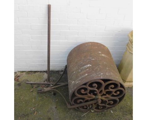 A Victorian cast iron garden roller, with pierced scrolling ends, 61.5cm W, 61.5cm Dia.