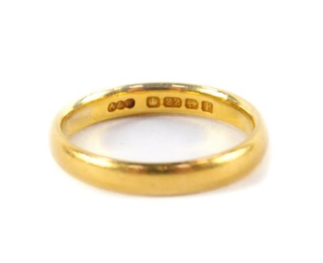 A 22ct gold wedding band, size K, 3.3g.