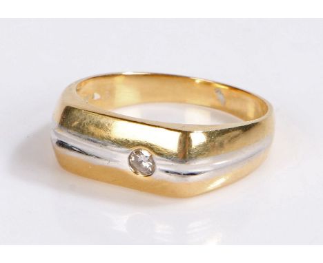 18 carat gold and diamond set ring, with a round cut diamond set to a white gold central stripe, 7.8 grams, ring size X