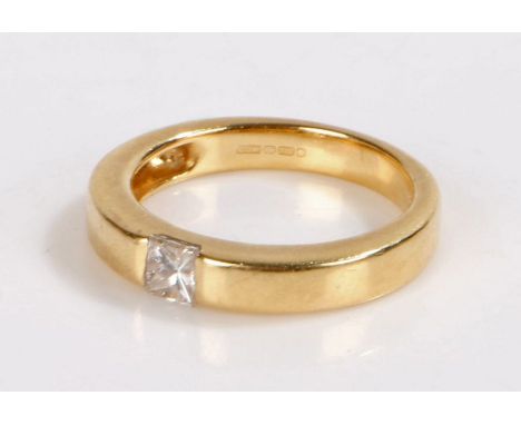 18 carat gold diamond set ring, with a princess cut diamond sunk into the shank, 5.1 grams, ring size N