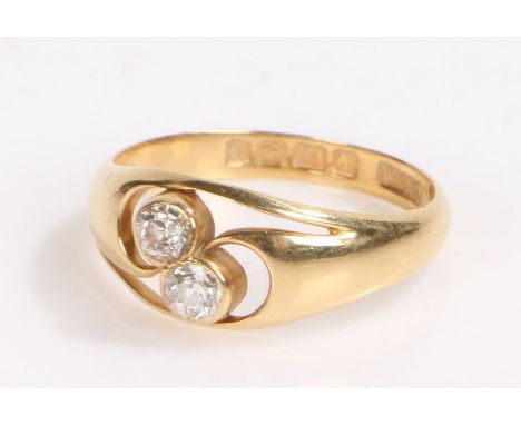 18 carat gold diamond set ring, with a diamond cross over to the head, 2.5 grams, ring size K