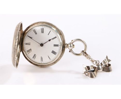 White metal ladies hunter pocket watch, the case with vacant shield shaped cartouche surrounded by foliate scrolls, the white