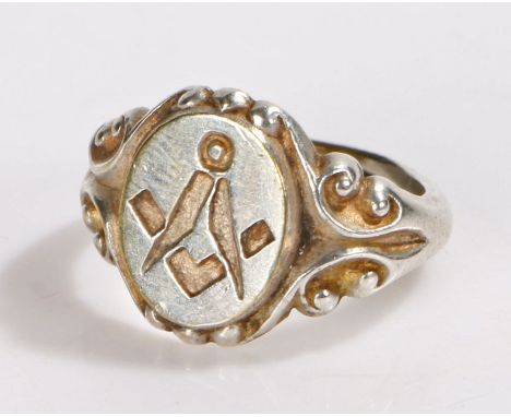 Silver Masonic ring, with a square and rule flanked by scrolls, 6.7 grams, ring size R