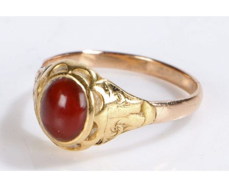 19th Century cabochon ring, the red cabochon cut stone to the head on a later shank, 3.6 grams, ring size R