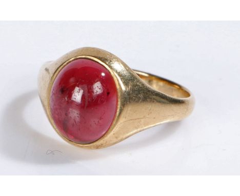 9 carat gold ring, set with a cabochon cut red stone, 4.8 grams, ring size U 1/2