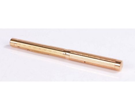 Swan Mabie Todd 9 carat gold fountain pen, with an engine turned case, 13cm long&nbsp;