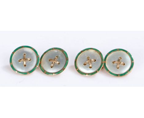 Pair of 9 carat gold and mother of pearl set cufflinks, the discs with a mother of pearl panel and a green enamel surround, 1