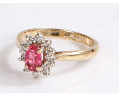 10 carat gold ring, set with a pink stone forming a flower head, 2.5 grams, ring size M 1/2