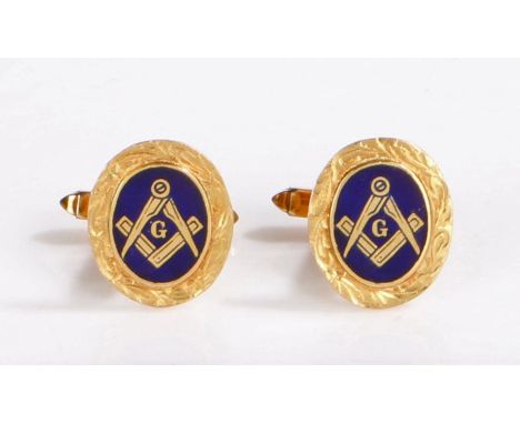 Pair of 9 carat gold and enamel cufflinks, each with an oval blue enamel panel centred by a compass and square, 7.5 grams&nbs