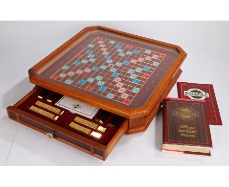 Scrabble Collector's Edition board game, the glazed removable top lifting to reveal the game board, the frieze drawer contain