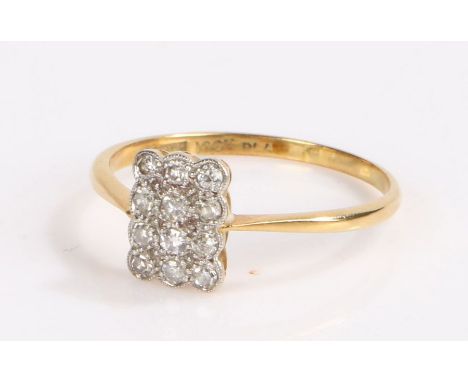 18 carat diamond set cluster ring, the rectangular head set with twelve round cut diamonds, 2.5 grams, ring size U