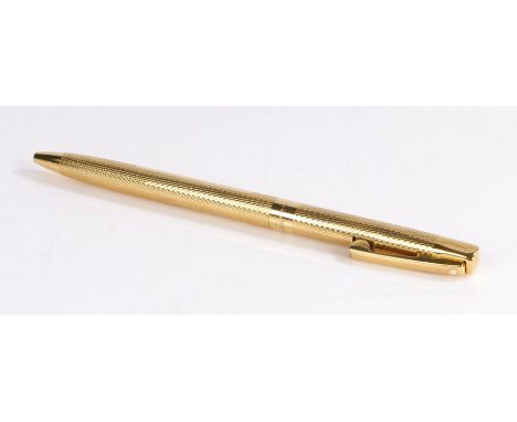 Sheaffer 18 carat gold ball point pen, with an engine turned case, 13cm long