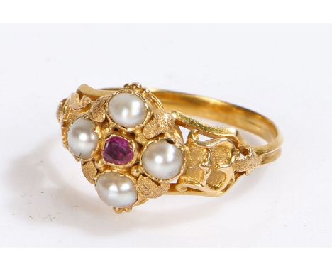 19th Century pearl and ruby set ring, the head in the form of a flower head with shaped shoulders, 2.3 grams, ring size L