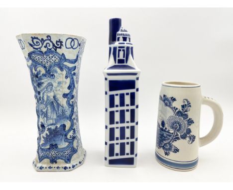 A Delftware vase and a similar jug, handpainted and a Sargadelos vase. H.29cm (largest).