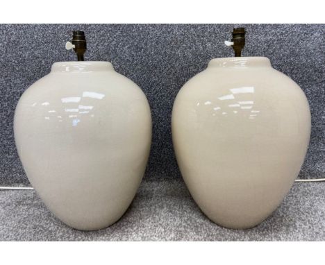 A pair of contemporary crackle glazed ceramic table lamps of globular form. H.45cm.