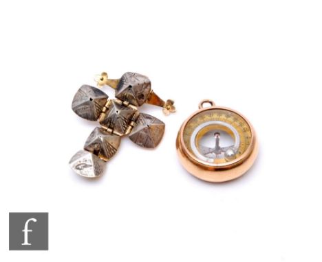 An early 20th Century 9ct mounted compass and thermometer fob of plain from terminating in pendant loop, diameter 26mm, with 