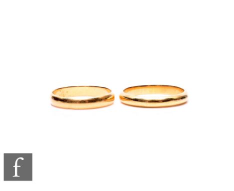 A 9ct wedding ring, weight 2.9g, with an 18ct examples, weight 4g. (2)