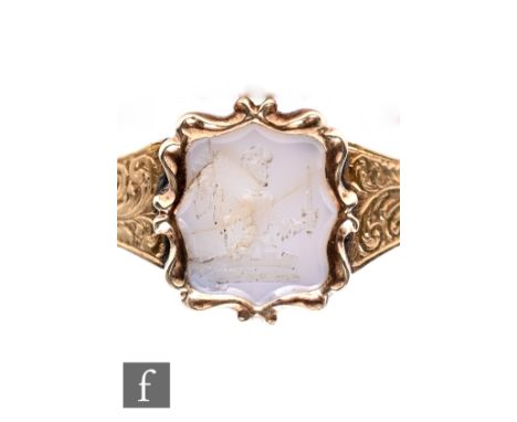 A 18ct Georgian seal ring with intaglio carved white agate stone depicting a seated Roman soldier, weight 3.3g, ring size L 1