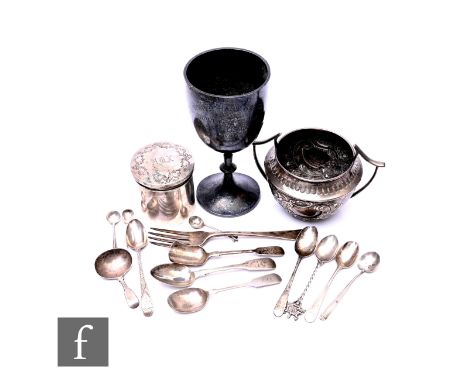 A small parcel lot of hallmarked silver items to include a goblet, a sugar basin, flatware etc, total weight 25oz, various st
