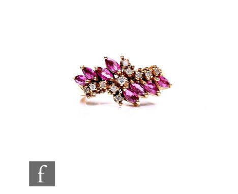 A 14ct pink sapphire and diamond cluster ring, brilliant cut diamonds within marquise cut sapphire borders, weight 5.6, ring 