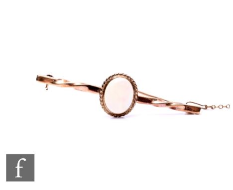 A 9ct opal bar brooch, weight 6g, length 60mm, length of opal 13.5mm.