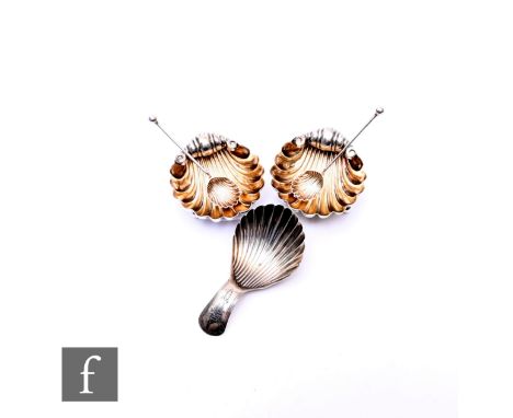 A George III silver tea caddy spoon of scallop shell form, Birmingham 1801, possibly John Turner, together with a late Victor